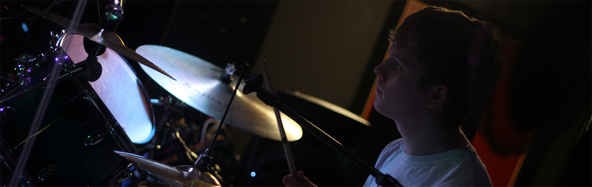 Photograph of a musician playing the drums