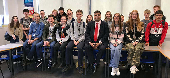 Wide angle photograph of the local MP visiting the college.