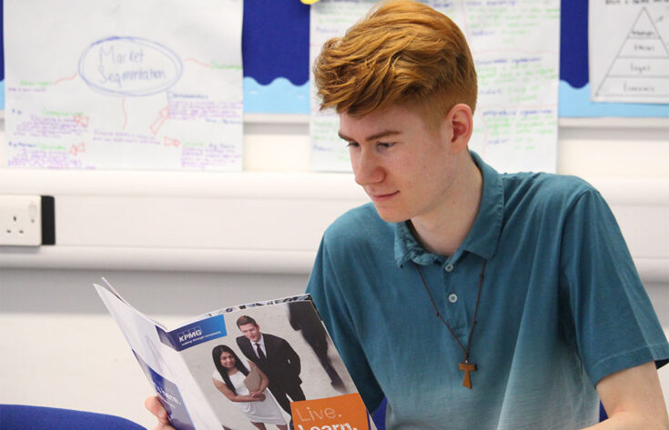 Photograph of an accounting student reading a book.