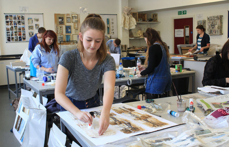 Photograph of an Art and Design student working on an art project