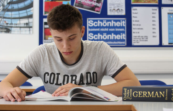 Photograph of a student studying German