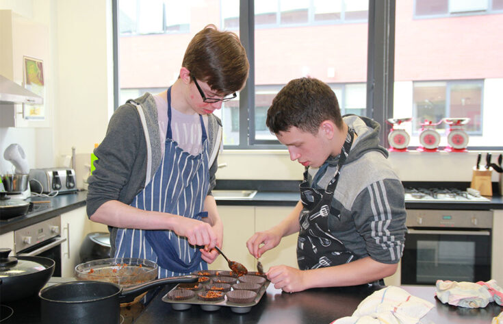 Photograph of Pathways students in the teaching kitchen