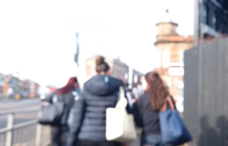 Photograph of students walking down the A6.