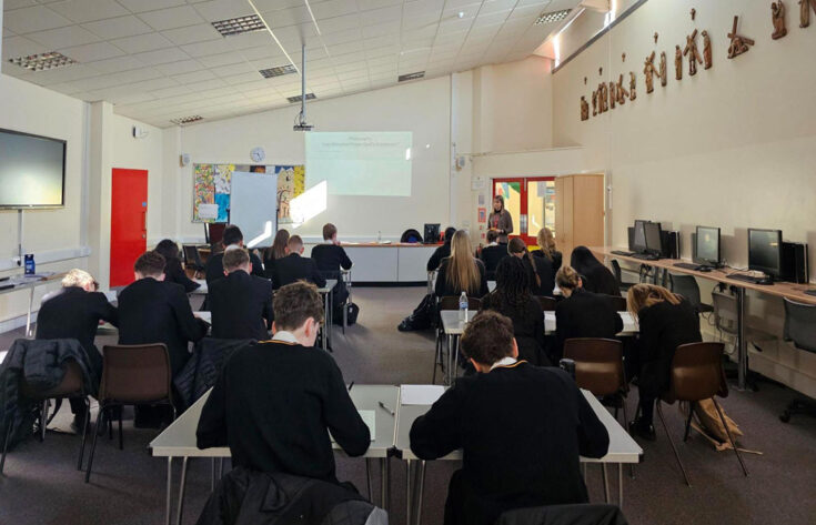 Photograph of an Aquinas teacher giving a Theology talk at St Thomas Moore school.