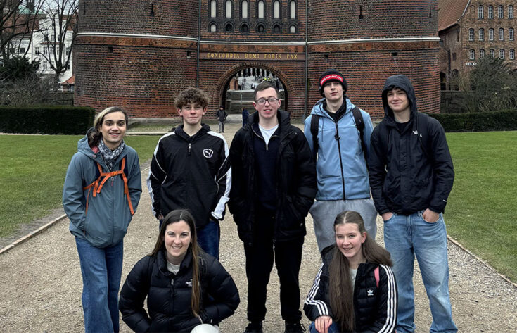 Photograph of German students outside the Holstentor (city gate) in Luebeck